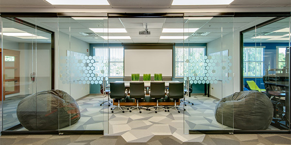 NxtWall demountable glass wall systems — adaptable architectural walls for open, flexible workspaces.